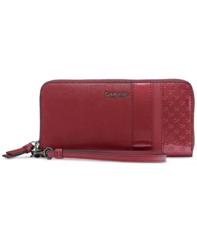 Calvin Klein Moon Signature Embossed Boxed Wallet In Cabrnt