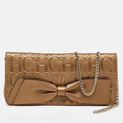 Ch Carolina Herrera Monogram Leather Bow Chain Clutch In Brown